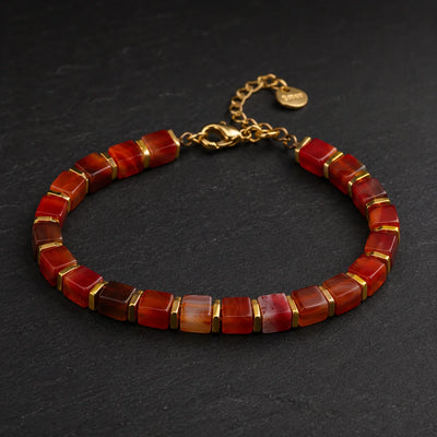 Red agate cube bead bracelet with gold-tone spacers