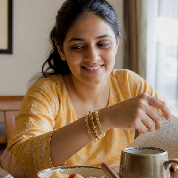 Citrine and Rosewood Bracelet Stack Set of 3 worn by an Indian woman - candid lifestyle photograph