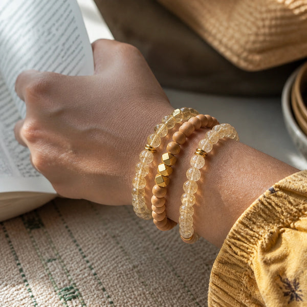 Citrine and Rosewood Bracelet Stack Set of 3 on an Indian womans wrist - realistic close-up lifestyle photo