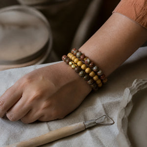 Picasso Jasper and Rosewood Bracelet Stack Set of 3 on an Indian womans wrist - realistic close-up lifestyle photo