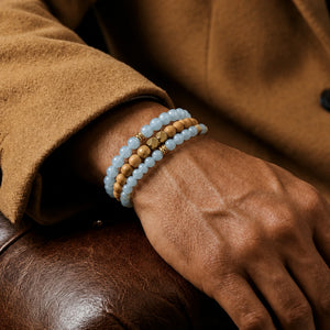 Aquamarine and Rosewood Bracelet Stack Set of 3 - luxury wrist model photograph on camel wool and aged leather