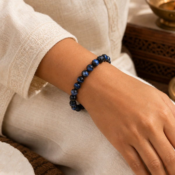 Blue Tiger Eye Bracelet 8mm worn on woman's wrist