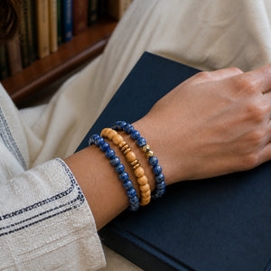 Lapis Lazuli and Rosewood Bracelet Stack Set of 3 on an Indian woman's wrist - library lifestyle photo