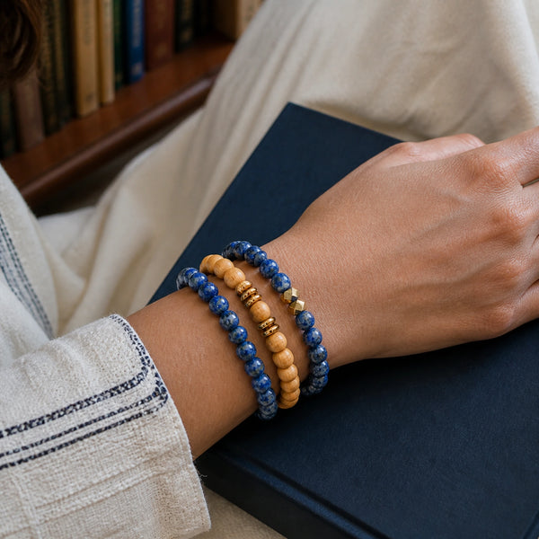 Lapis Lazuli and Rosewood Bracelet Stack Set of 3 on an Indian woman's wrist - library lifestyle photo