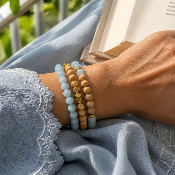 Aquamarine and Rosewood Crystal Bracelet Stack Set of 3 on an Indian woman's wrist - serene lifestyle photo