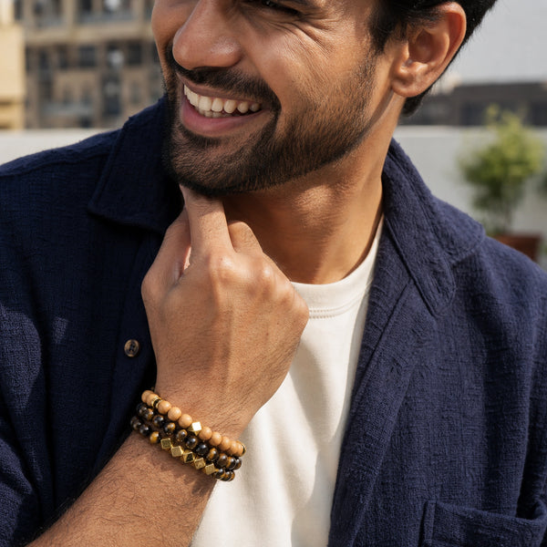 Tiger Eye and Rosewood Crystal Bracelet Stack Set of 3 worn by an Indian man - lively model photo