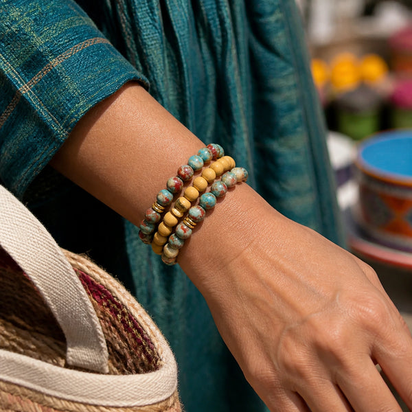Multi Imperial Jasper and Rosewood Bracelet Stack Set of 3 on an Indian woman's wrist - natural lifestyle photo