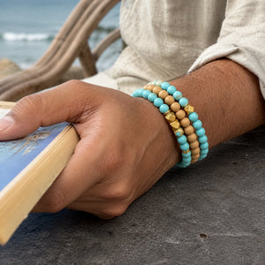 Turquoise and Rosewood Bracelet Stack Set of 3 on an Indian mans wrist - realistic close-up lifestyle photo
