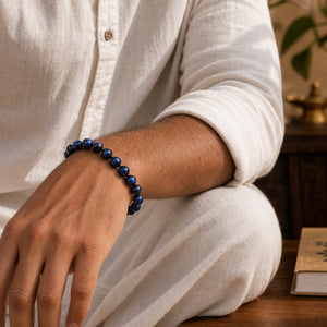 Blue Tiger Eye Bracelet 8mm worn on man's wrist