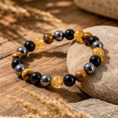 The Quadruple Protection Bracelet 8mm product angle on natural stones