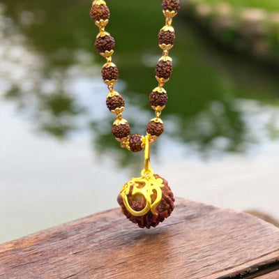 Gold-plated 7 mukhi rudraksha necklace with Om Shree pendant, original Nepali beads - Soultheory India