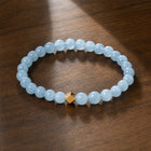 Aquamarine 6mm Bead Bracelet with Gold Accent