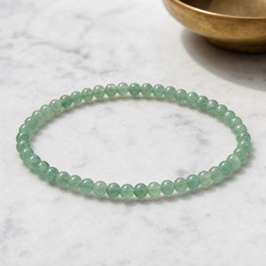 Soultheory Aventurine 4mm Round Bead Bracelet on white marble
