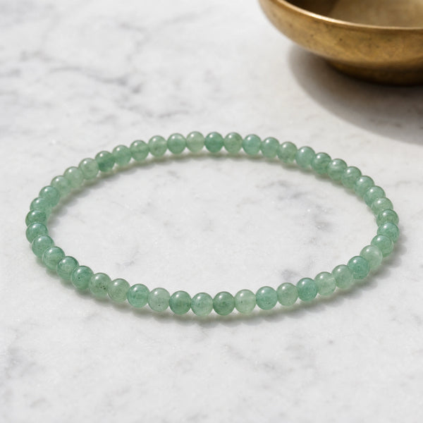 Soultheory Aventurine 4mm Round Bead Bracelet on white marble