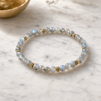 Soultheory Labradorite 4mm Bead Bracelet with Gold Spacers on white marble