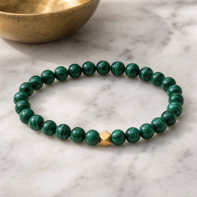 Soultheory Malachite 6mm Bead Bracelet with Gold Accent on white marble