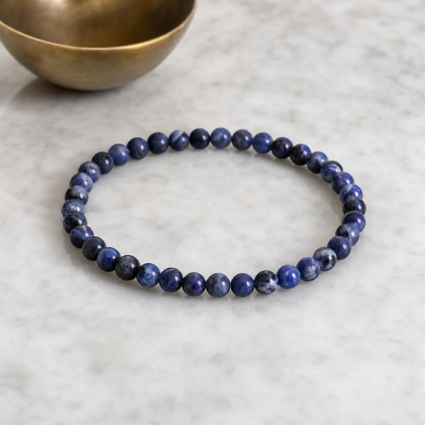 Soultheory Sodalite 4mm Round Bead Bracelet on white marble
