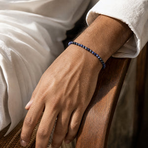 Man wearing the Sodalite 4mm Round Bead Bracelet with a white kurta