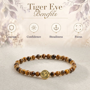 Tiger Eye benefits - courage, confidence, steadiness and focus - with the Tiger Eye 4mm bracelet and gold Om charm
