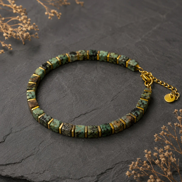 Natural African turquoise bracelet with golden hematite beads for growth and balance - Soultheory India