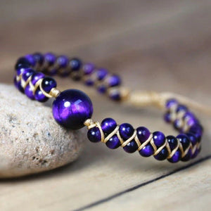 Amethyst cosmic eclipse bracelet with gold cord wrap and a large centre bead for calm - Soultheory India
