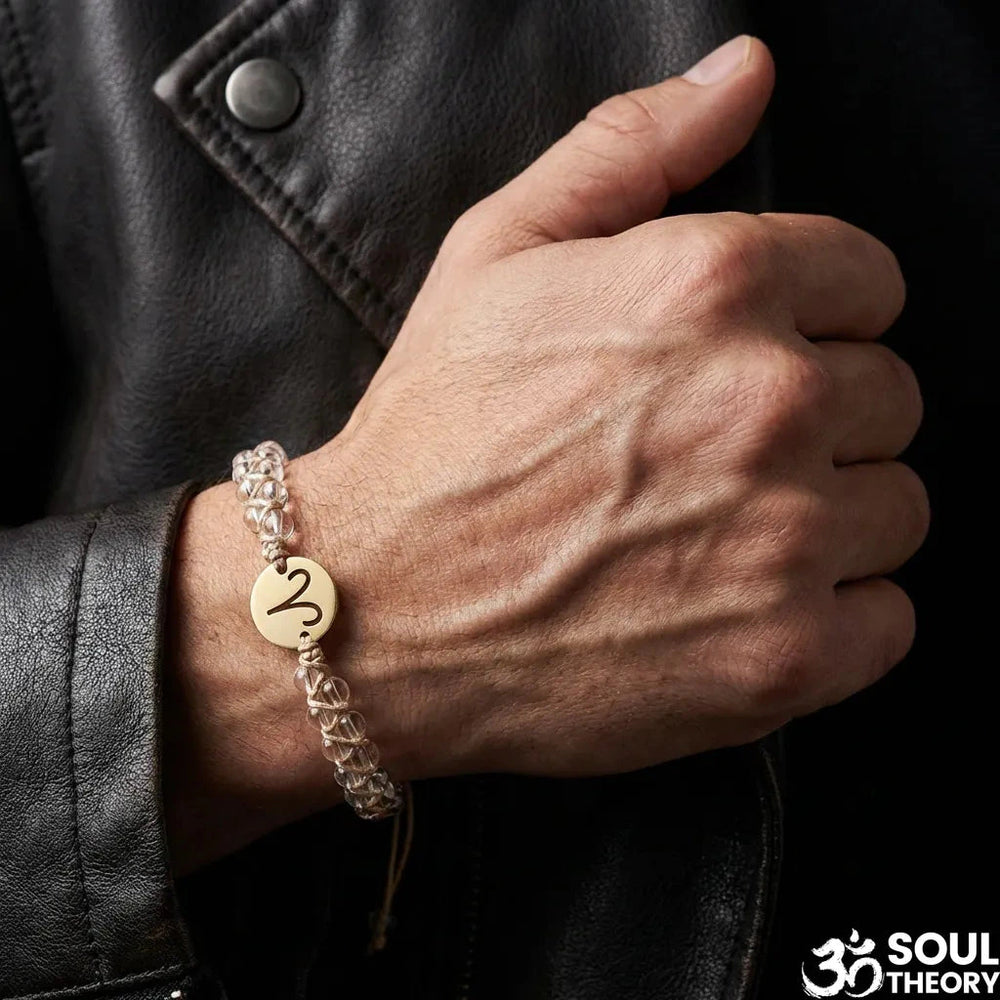 Aries zodiac energy stone bracelet with gold sign charm and clear quartz beads for confidence - Soultheory India