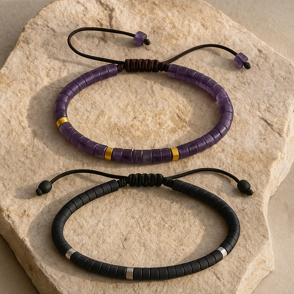 Black onyx protection bracelet paired with amethyst bracelet on stone, gold and silver accent beads