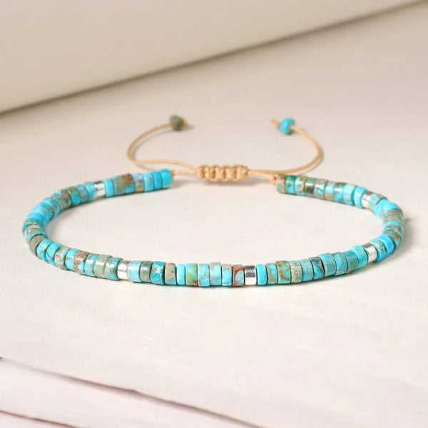 Turquoise aqua terra imperial jasper bracelet with silver beads and adjustable cord for calmness