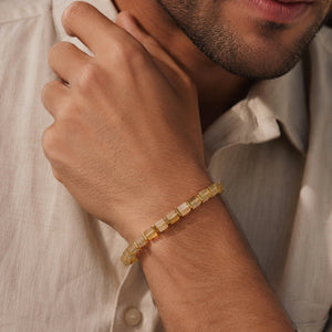 Citrine bracelet with golden hematite styled on a man's wrist for everyday abundance