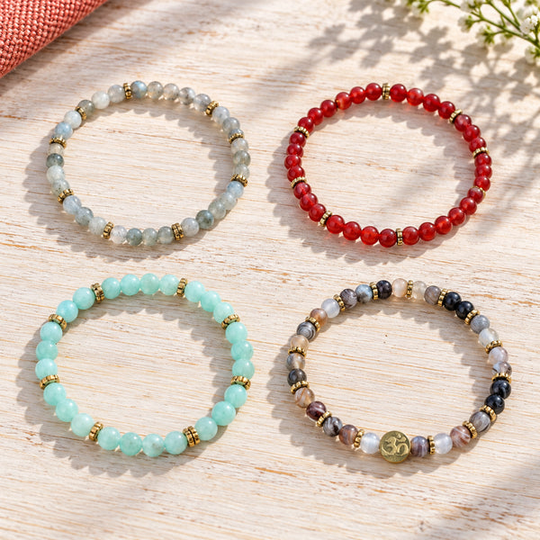 Soultheory Healthy 4 mm bracelet stack with Labradorite, Carnelian - four bracelets on a sunlit table