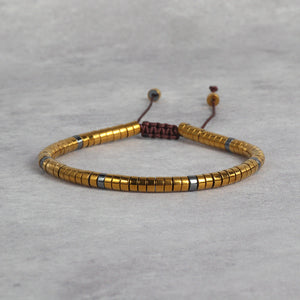 Natural gold hematite bracelet with adjustable cord for grounding and protection - Soultheory India