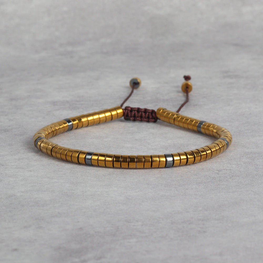 Natural gold hematite bracelet with adjustable cord for grounding and protection - Soultheory India
