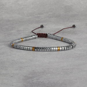 Natural hematite bracelet with silver and gold disc beads for grounding - Soultheory India