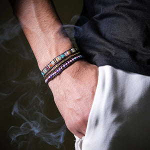 Imperial jasper wrap bracelet worn on a man's wrist, multi-row leather design for grounding and protection