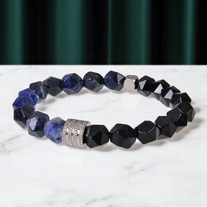 Faceted lapis lazuli and black obsidian bracelet with silver spacer for wisdom and protection