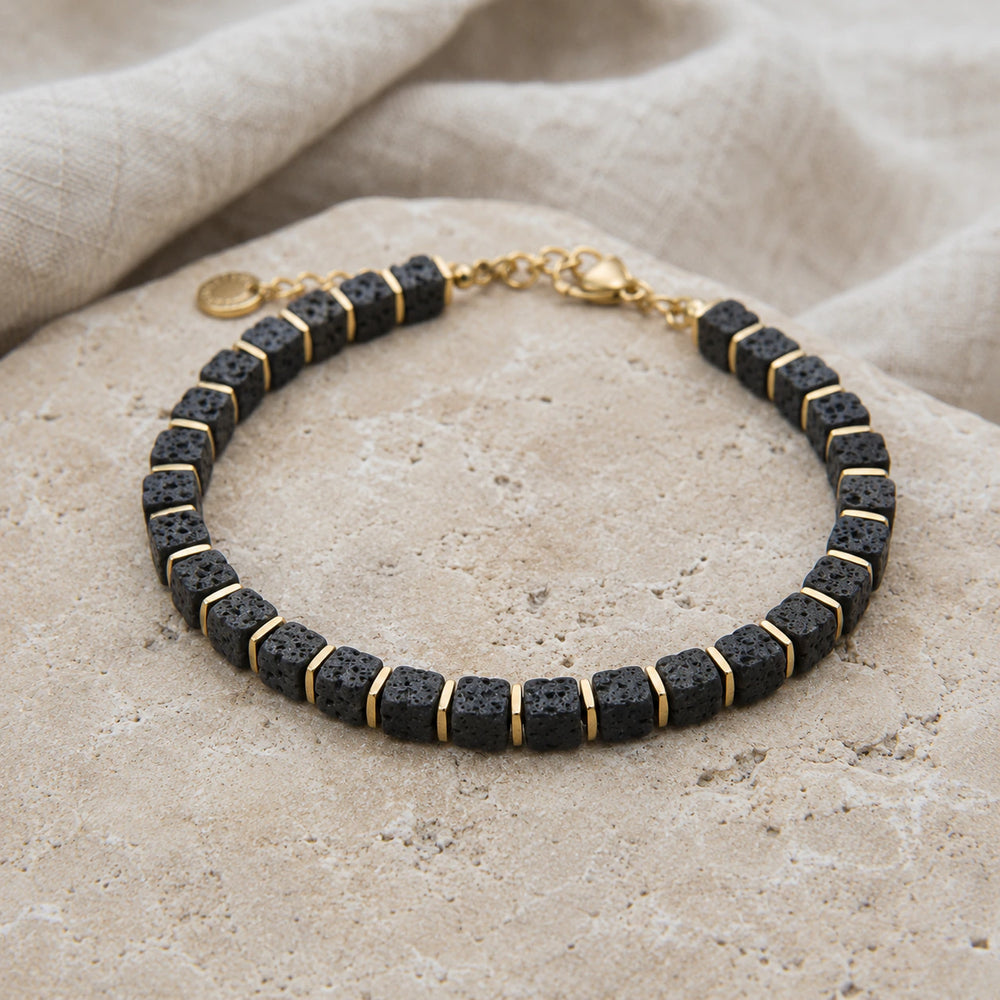 Natural lava stone bracelet with golden hematite beads for grounding and strength - Soultheory India