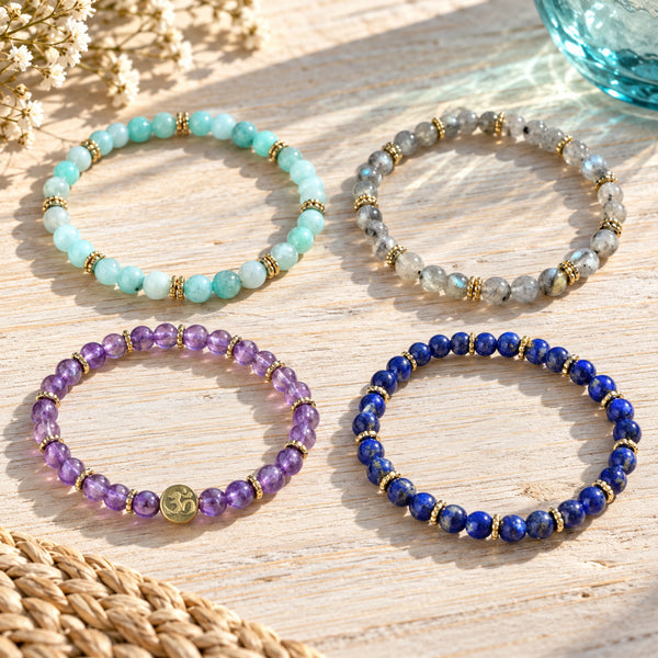 Soultheory Manifestation 4 mm bracelet stack with Amazonite, Labradorite - four bracelets on a sunlit table