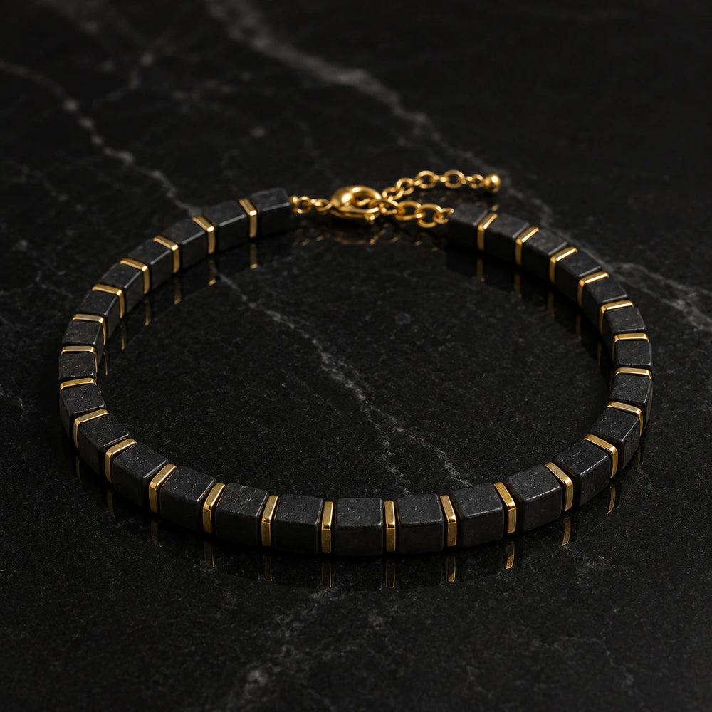 Natural black onyx bracelet with golden hematite beads for protection and grounding - Soultheory India