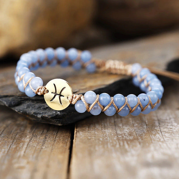 Pisces zodiac stone bracelet with blue beads and gold sign charm for intuition and calm - Soultheory India