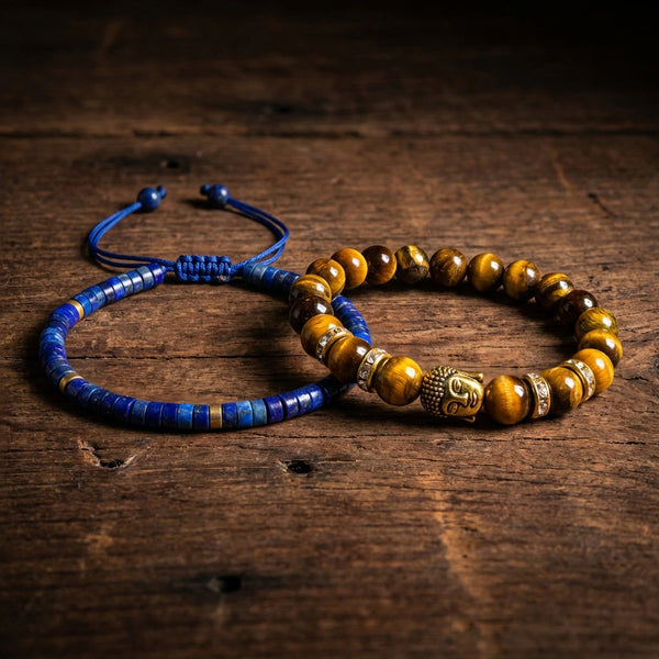 Tiger eye and lapis lazuli couple bracelet set paired on rustic wood with gold Buddha and brass accents