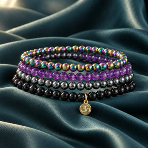 Soultheory Protection Bracelet Stack - Rainbow Hematite, Hematite, Black Tourmaline & Amethyst (Set of 4) - fabric styling photograph