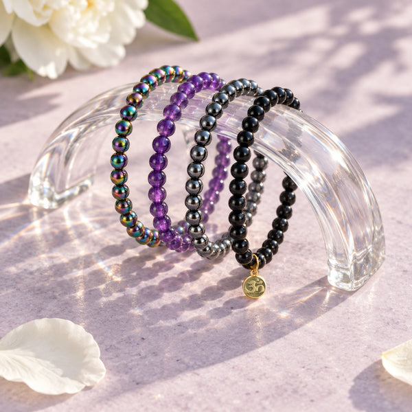 Soultheory Protection Bracelet Stack - Rainbow Hematite, Hematite, Black Tourmaline & Amethyst (Set of 4) - editorial product photograph
