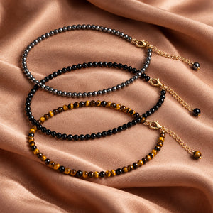 Soultheory Protection Anklet Set - Hematite, Black Obsidian & Tiger's Eye (3 Pieces) - fabric styling photograph