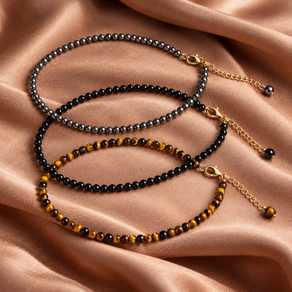 Soultheory Protection Anklet Set - Hematite, Black Obsidian & Tiger's Eye (3 Pieces) - fabric styling photograph