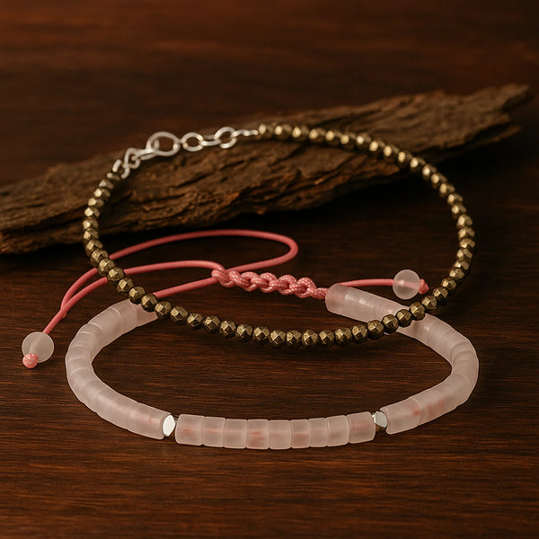 Pyrite anklet and rose quartz bracelet combo flat lay on dark wood with bark