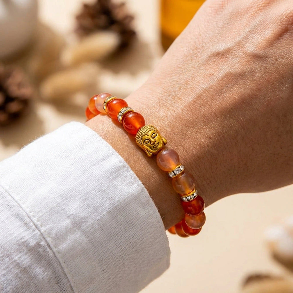 Natural red carnelian bracelet with gold Buddha for courage and vitality - Soultheory India