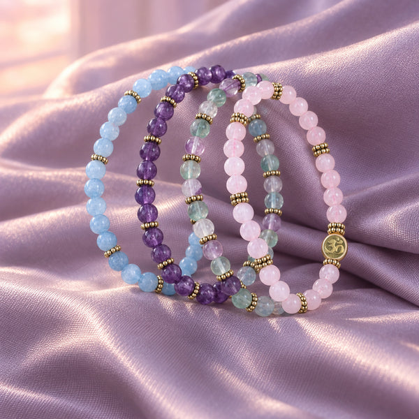 Soultheory Soothe 4 mm bracelet stack with Amethyst, Rose Quartz - fabric styling photograph