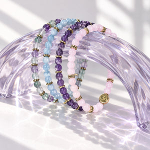 Soultheory Soothe 4 mm bracelet stack with Amethyst, Rose Quartz - editorial product photograph