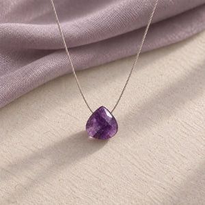 Amethyst Fine Cord Necklace - hero photograph on a styled surface