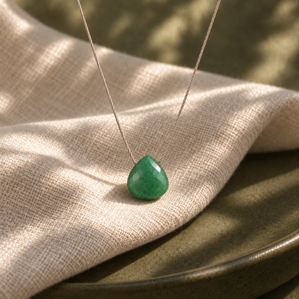 Green Aventurine Fine Cord Necklace - hero photograph on a styled surface